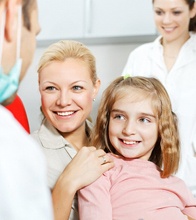 young girl in dental chair