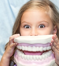 young girl at dentist