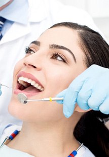 patient getting dental checkup 