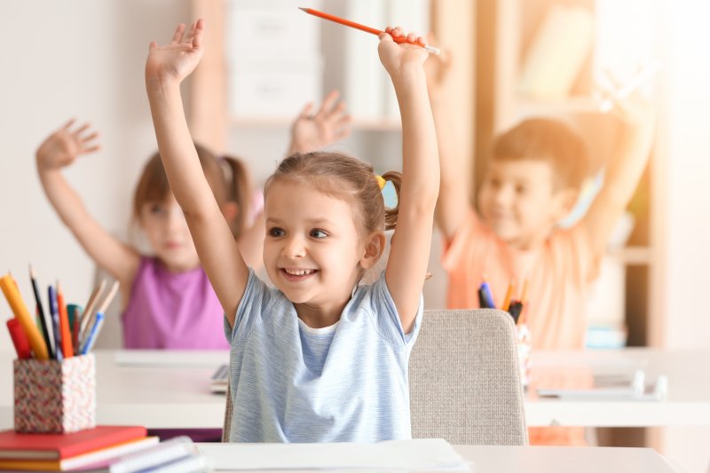 young girl participating 