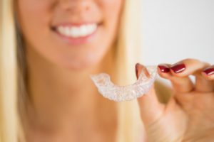 woman with invisalign