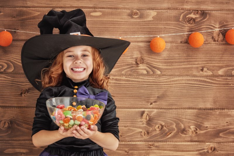 child smiling with cavities after Halloween in Blaine